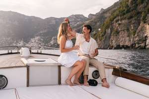 Couple photoshoot on boat in Amalfi Coast
