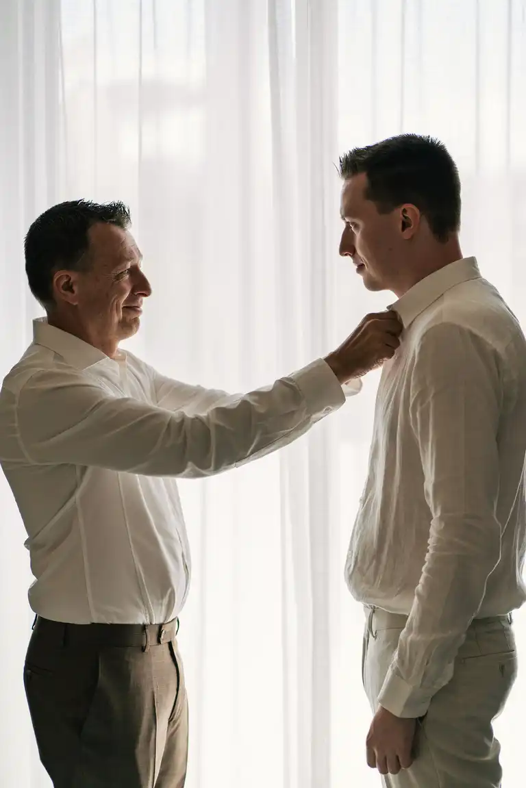 Father and son getting ready for destination wedding in Sorrento