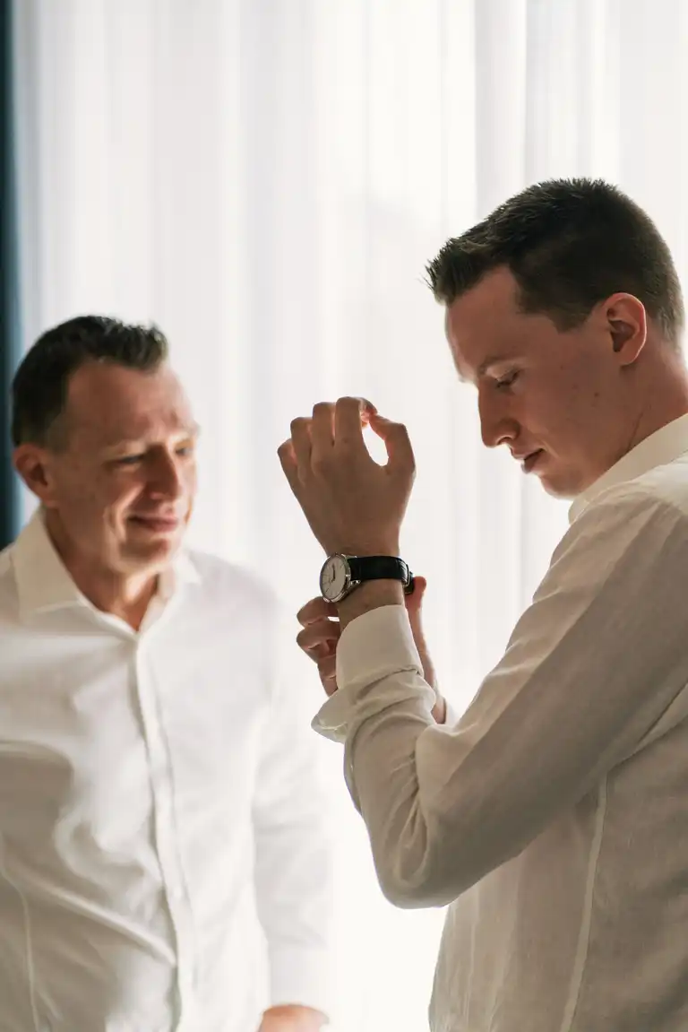 Father and son getting ready for destination wedding in Sorrento