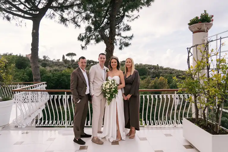 Family photo with bride and broom in Sorrento Dream Resort