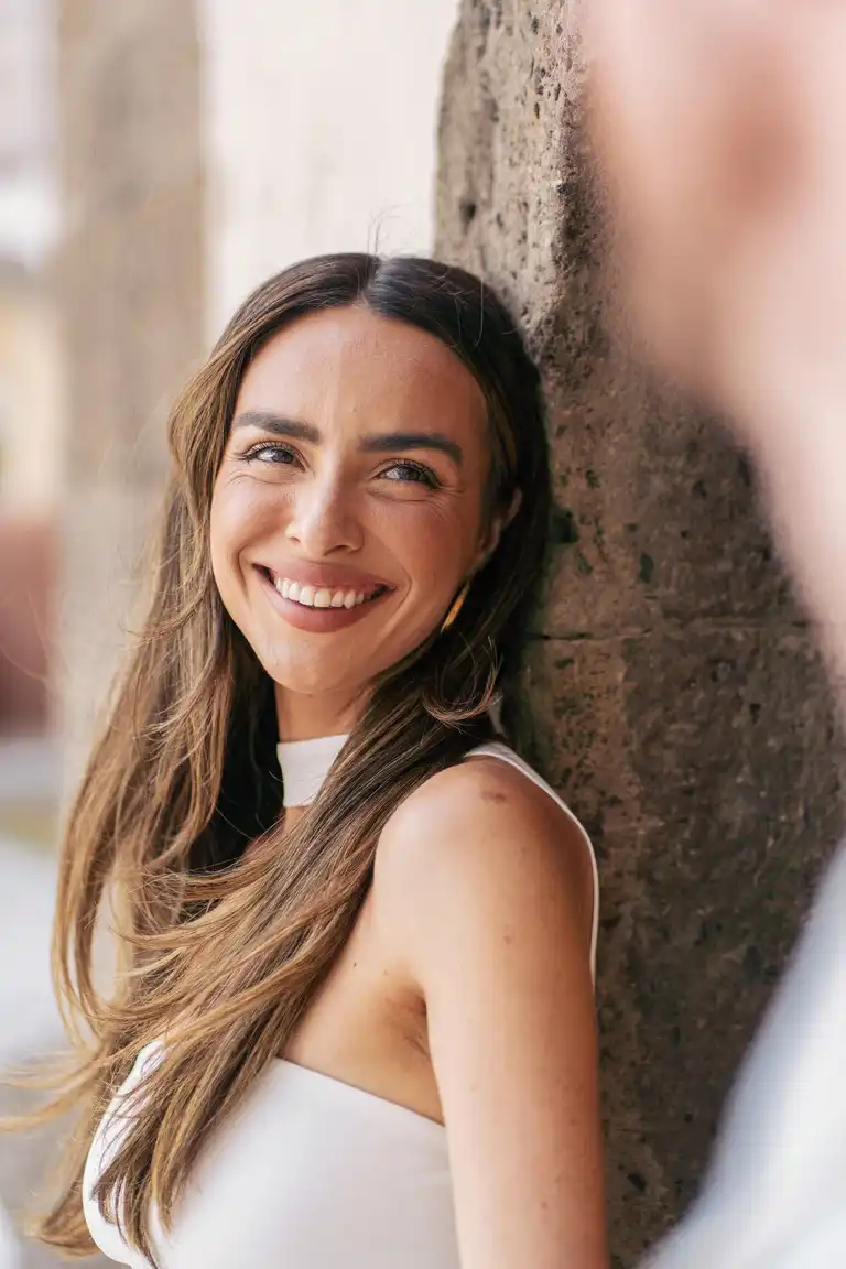 A beatiful woman smiling at her fiancé in Positano