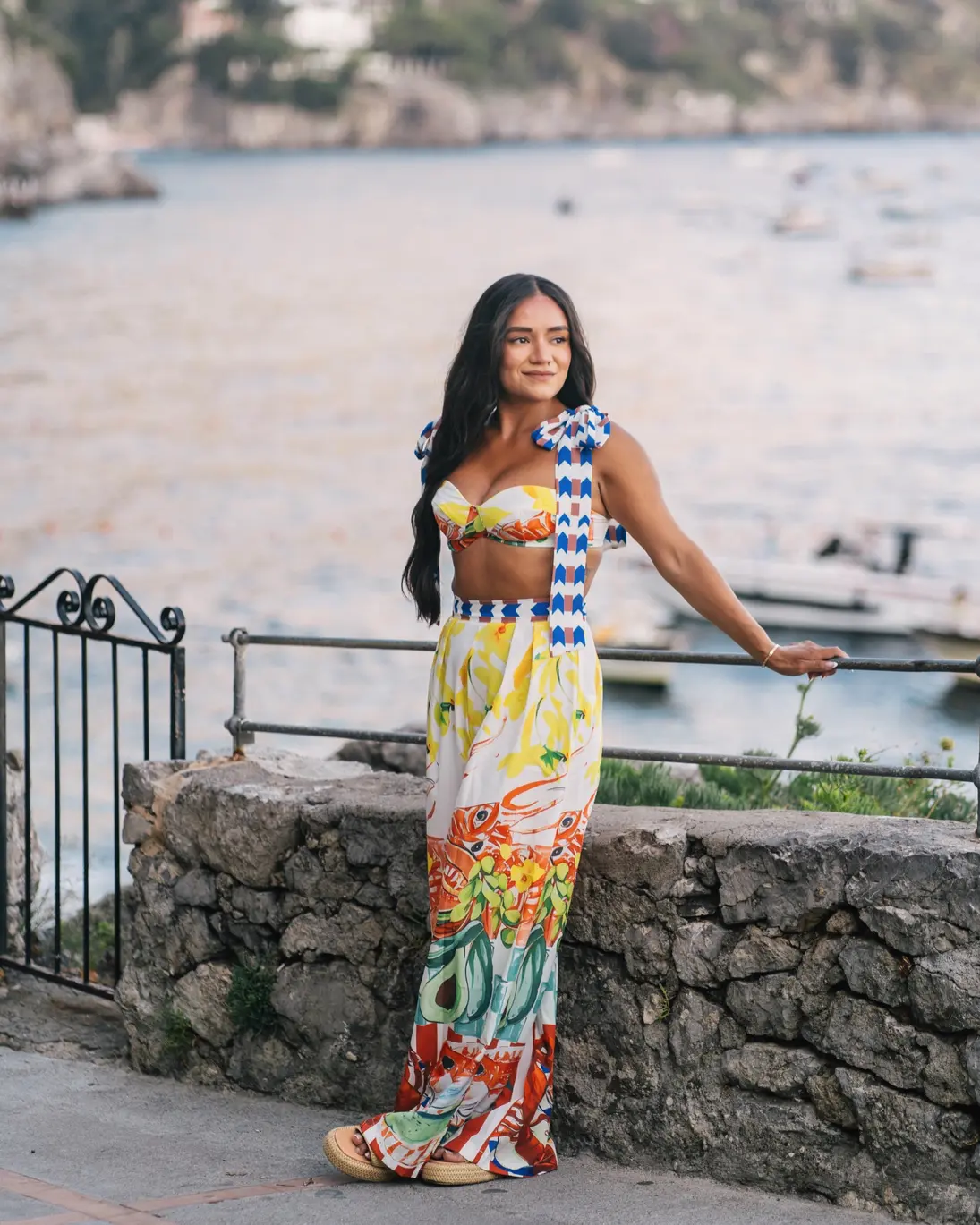 Woman wearing a colorful dress in Positano