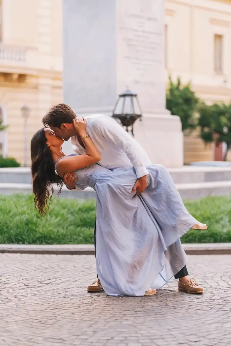 Expressing love with a passione dip kiss in the square of Sorrento