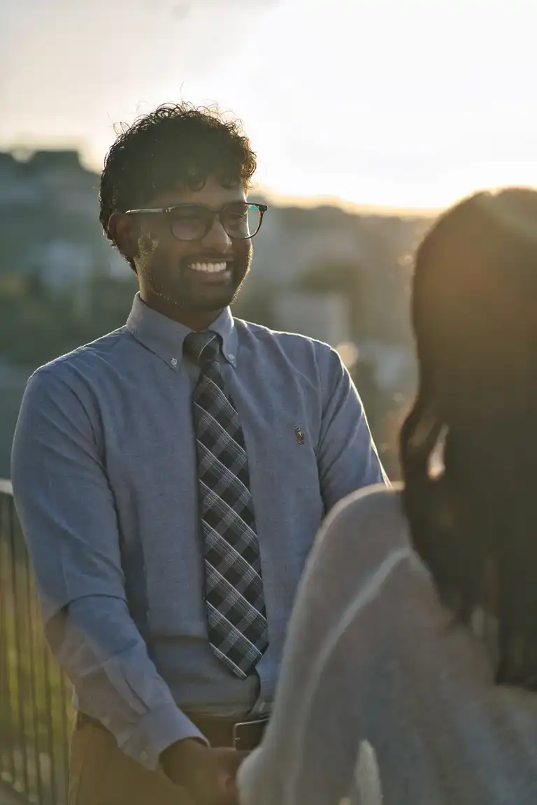 Man smiling happy at his girlfriend after the proposal in Sorrento