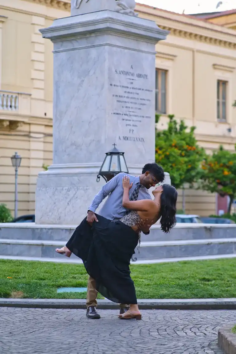 Couple dancing in Sorrento as they kiss romantically for their proposal photoshoot