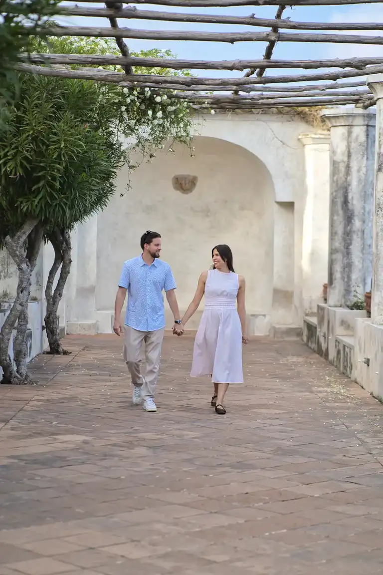 couple walking together in Villa Rufolo