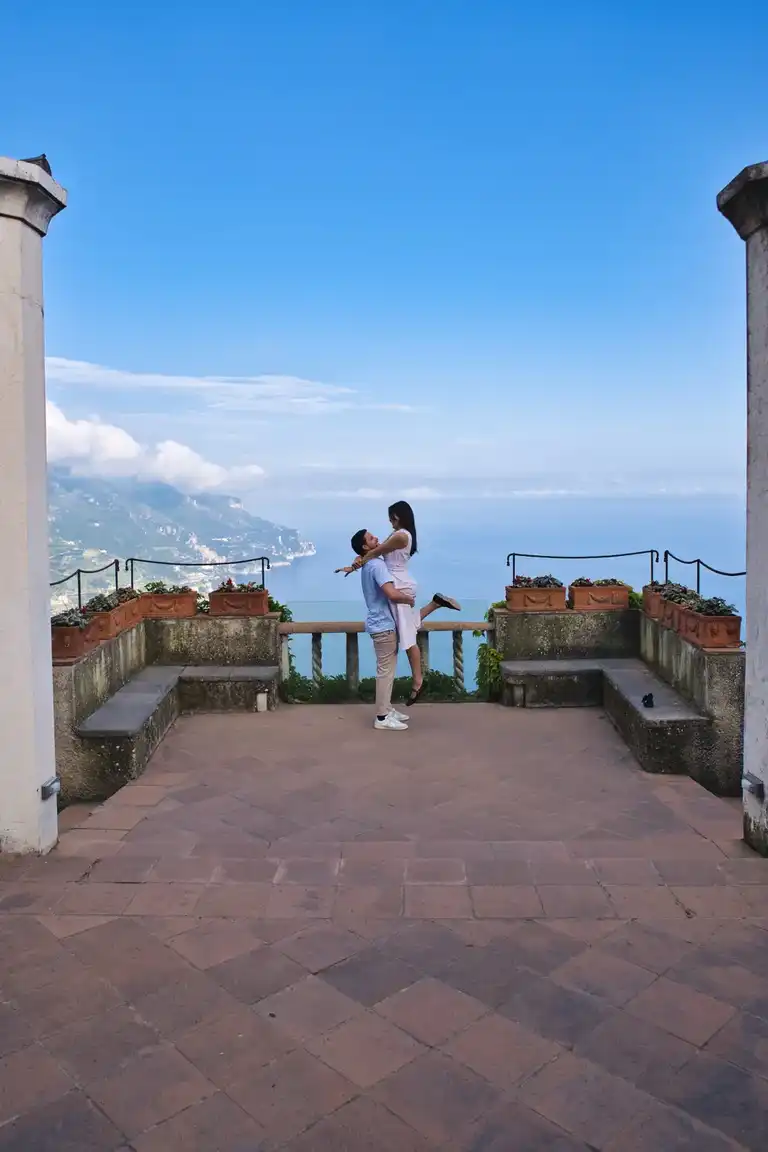 Romantic pose for a couple that just proposed on the main terrace of Villa Rufolo in Ravello