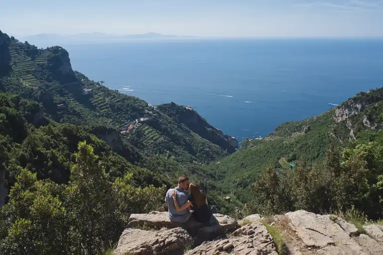 Surprise proposal at sunrise on the Path of the Gods hiking trail in Amalfi Coast near Bomerano.