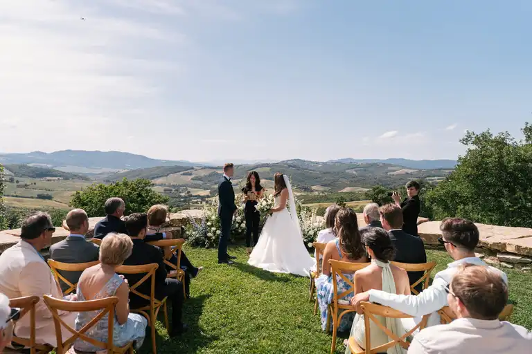 The preparation of the wedding ceremony in a Tuscany Villa with gorgeous hills in the background